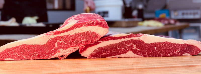 Brisket on the counter of a butcher shop