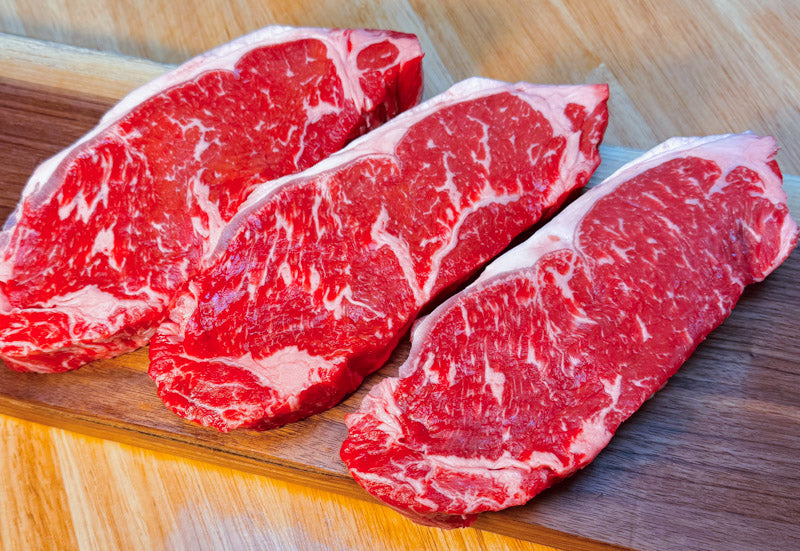 AAA Beef Striploin Steak, 14oz, grilled to perfection with rich beef flavour